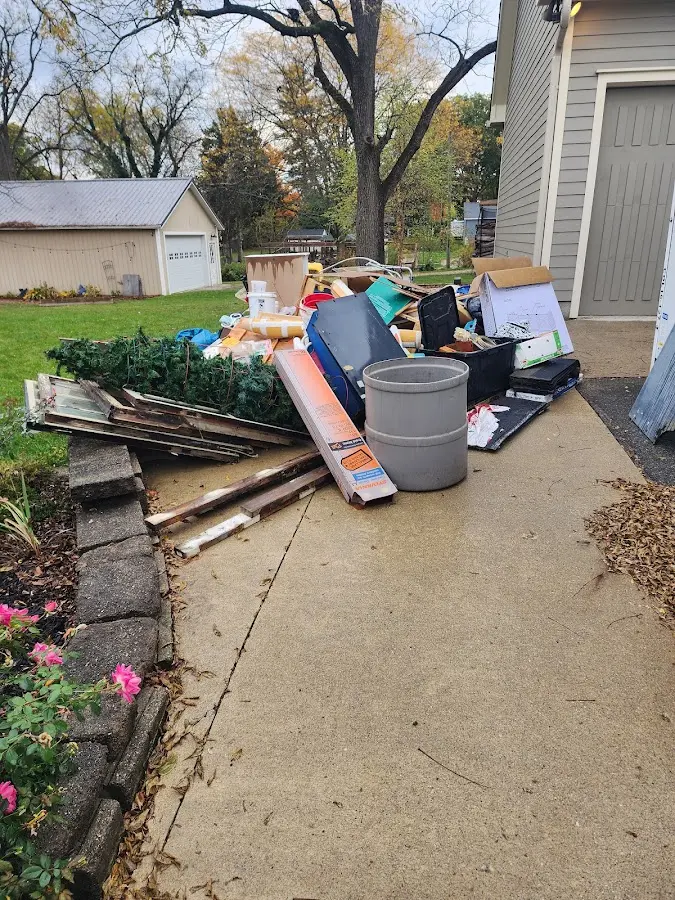 Dumpster being loaded with debris for 30 Yard Dumpster Rental in Northampton